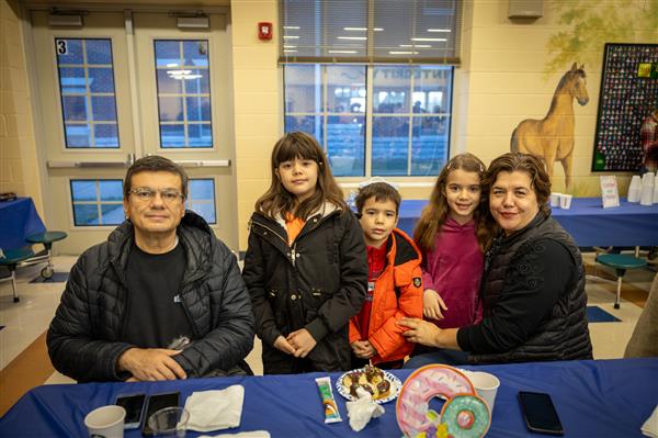 family sitting at a table